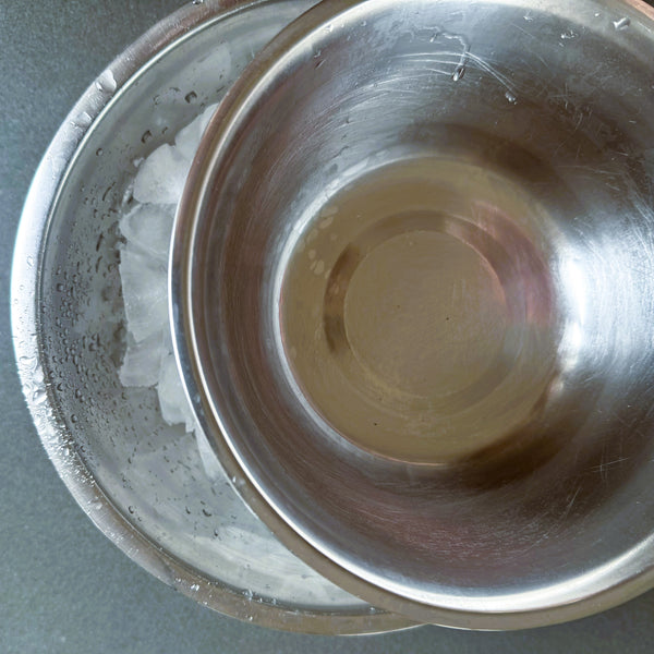 putting a bowl on top of the ice bath