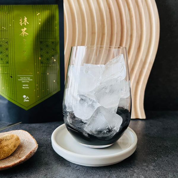 adding ice to fill up the glass