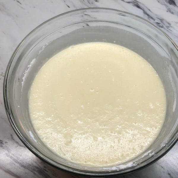 mixing the mochi batter until everything is well incorporated