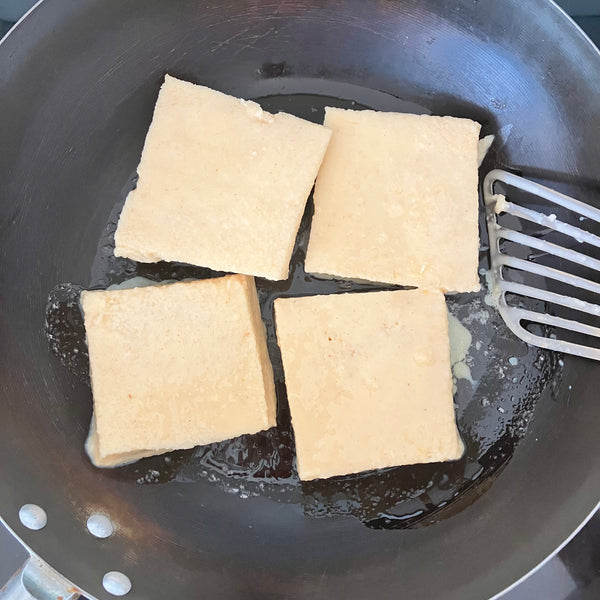 4 pieces of shokupan french toast in the pan