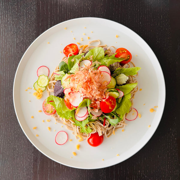 arranging the soba noodle salad toppings