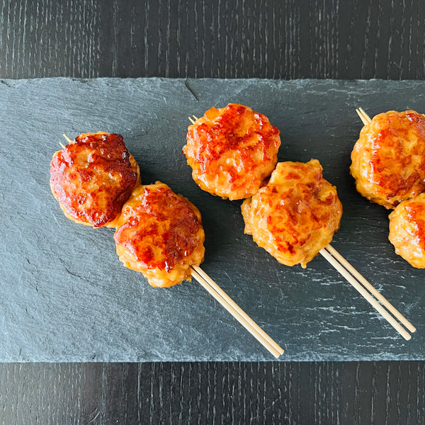skewering tsukune