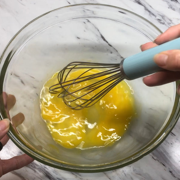 mixing the eggs