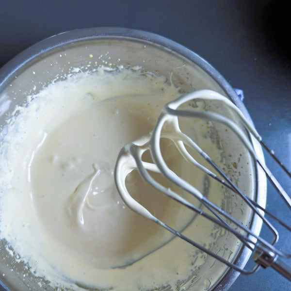 beating the egg yolks and sugar until the mixture turns pale