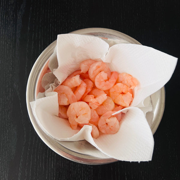drained shrimp, over paper towels
