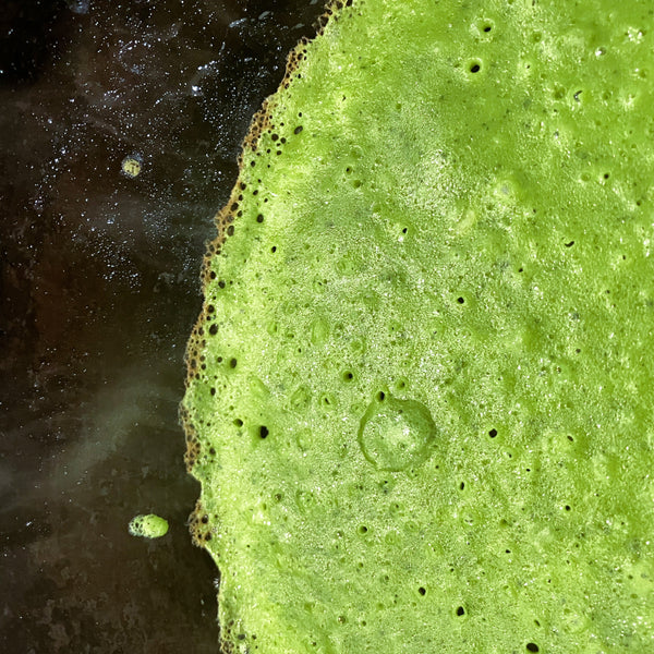 waiting for the matcha crepe to cook on one side