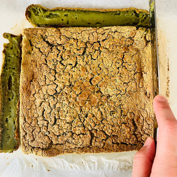 cutting the edges of the cake