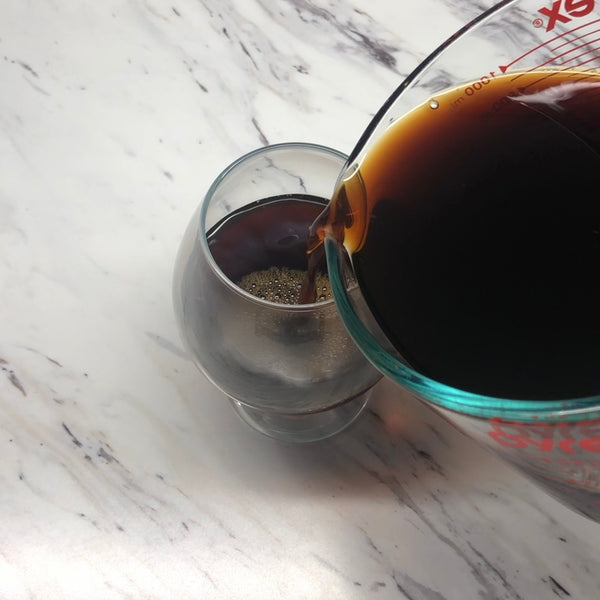 pouring coffee jelly into a cup