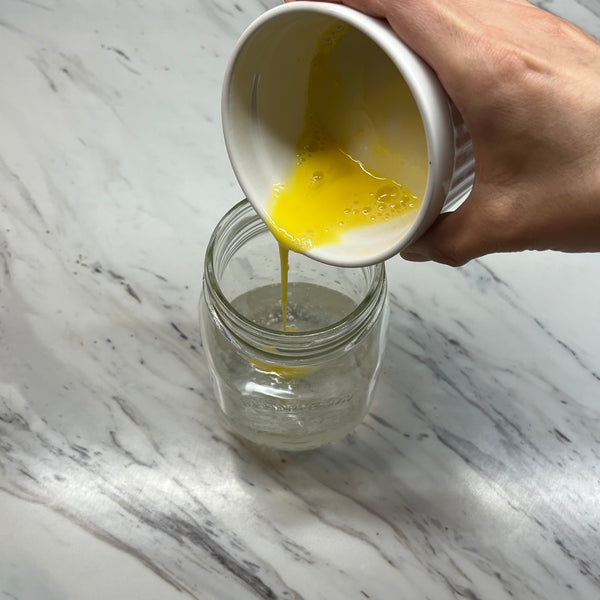 adding the beaten egg