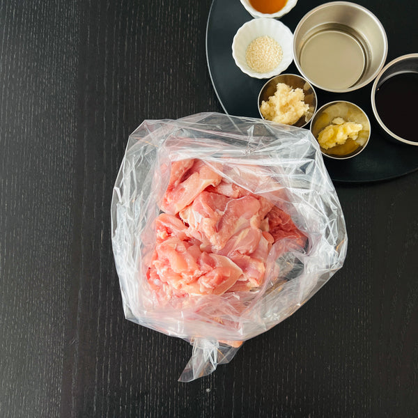 putting the chicken in a bag