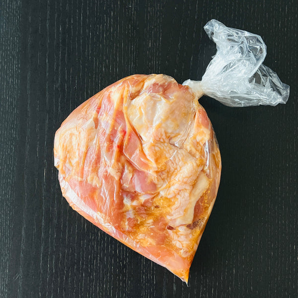 marinating the chicken in the seasonings