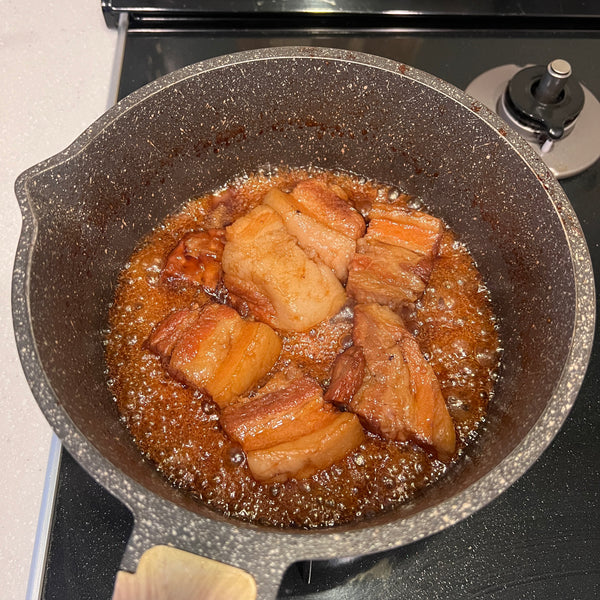 buta no kakuni, after the broth has been reduced